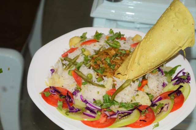 Biryani Flavoured Indian Brown Lentil Stew with Vegetable Pilaf